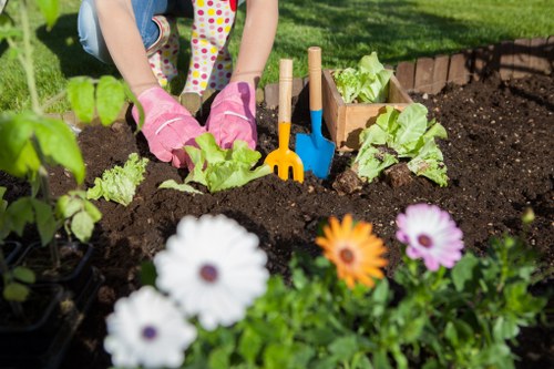 Barnehurst garden planting beds with shrubs and seasonal color